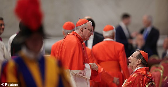 Members of the clergy gather, on the day the Dean of the College of Cardinals, Cardinal Giovanni Battista Re presides over the Holy Mass, celebrated for the election of the new pope, in St. Peter's Basilica, at the Vatican, May 7, 2025. REUTERS/Murad Sezer