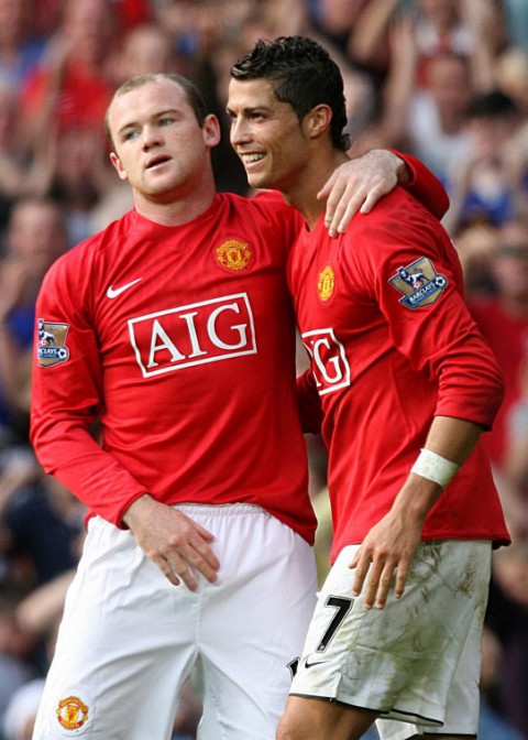 Manchester United's Wayne Rooney (left) celebrates scoring his sides second goal with Cristiano Ronaldo during the Barclays Premier League match at Old Trafford, Manchester. Manchester United V Bolton Wanderers (2-0) PRESS ASSOCIATION Photo. Picture date: Saturday September 27, 2008. See PA story SOCCER Man Utd. PRESS ASSOCIATION Photo. Photo credit should read: Martin Rickett/PA Wire. RESTRICTIONS: Use subject to restrictions. Editorial print use only except with prior written approval. New media use requires licence from Football DataCo Ltd. Call +44 (0)1158 447447 or see www.paphotos.com/info/ for full restrictions and further information.