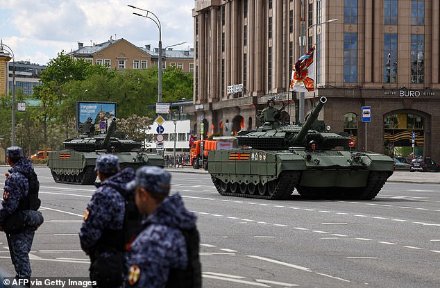 Russian servicemen march towards Red Square for the general rehearsal of the Victory Day military parade in central Moscow on May 7, 2025