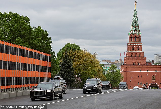 Members of the delegations, led by Russian President Vladimir Putin and Chinese President Xi Jinping, attend a welcoming ceremony before their talks at the Kremlin in Moscow on May 8, 2025