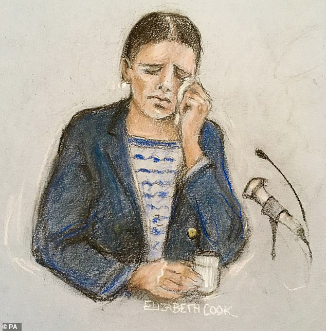 A court artist sketch of Rebekah wiping away tears as she gave evidence at the Royal Courts Of Justice