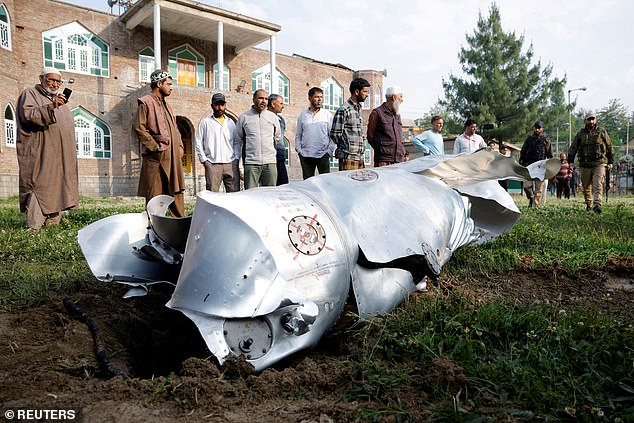The remnants of what appears to be a French manufactured fighter jet lies on the ground after being shot down in Wuyan in India-administered Kashmir's Pulwama district May 7, 2025