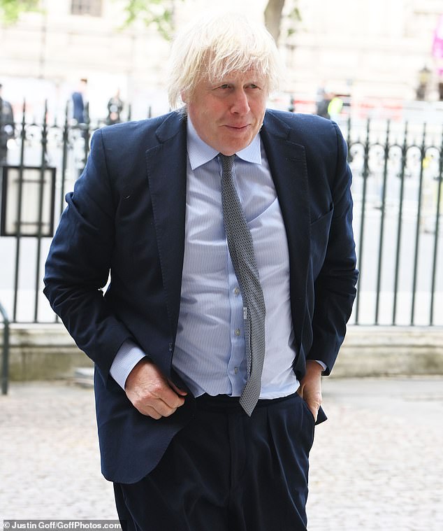 Former Prime Minister Boris Johnson arrives at Wesminster Abbey this morning for the service