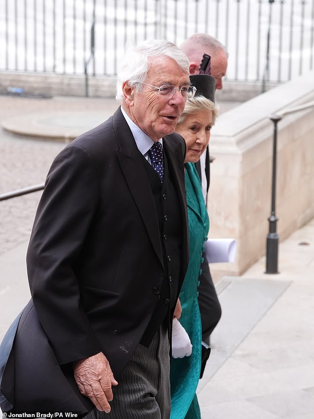 Former prime minister John Major and wife Norma Major arrive to attend the service today