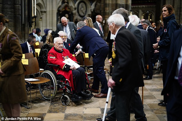 A Chelsea Pensioner attends a service of thanksgiving at Westminster Abbey in London today