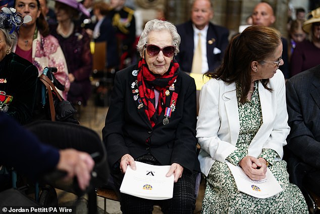 Second World War veteran Marie Scott attends a service of thanksgiving in London today