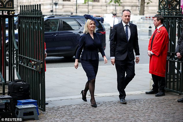 Former Prime Minister Liz Truss and her husband Hugh O'Leary arrive this morning