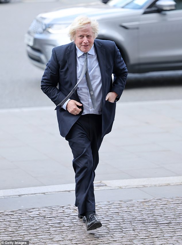 Former Prime Minister Boris Johnson arrives at Wesminster Abbey this morning for the service
