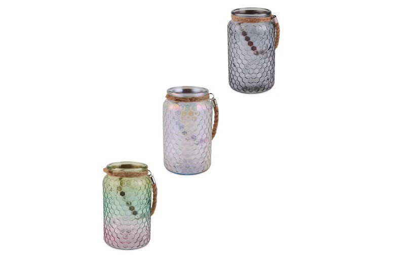 Three honeycomb-patterned glass lanterns in varying pastel colors.