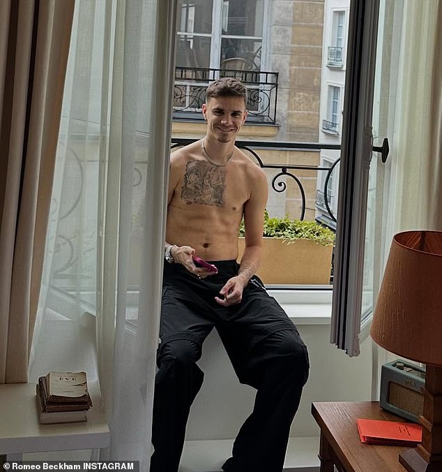 Romeo posted a shirtless picture of himself sitting in the windowsill at his hotel as he gave his followers an insight into the trip