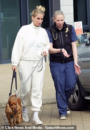 Stacey was then seen leaving the building after an hour alongside a local vet