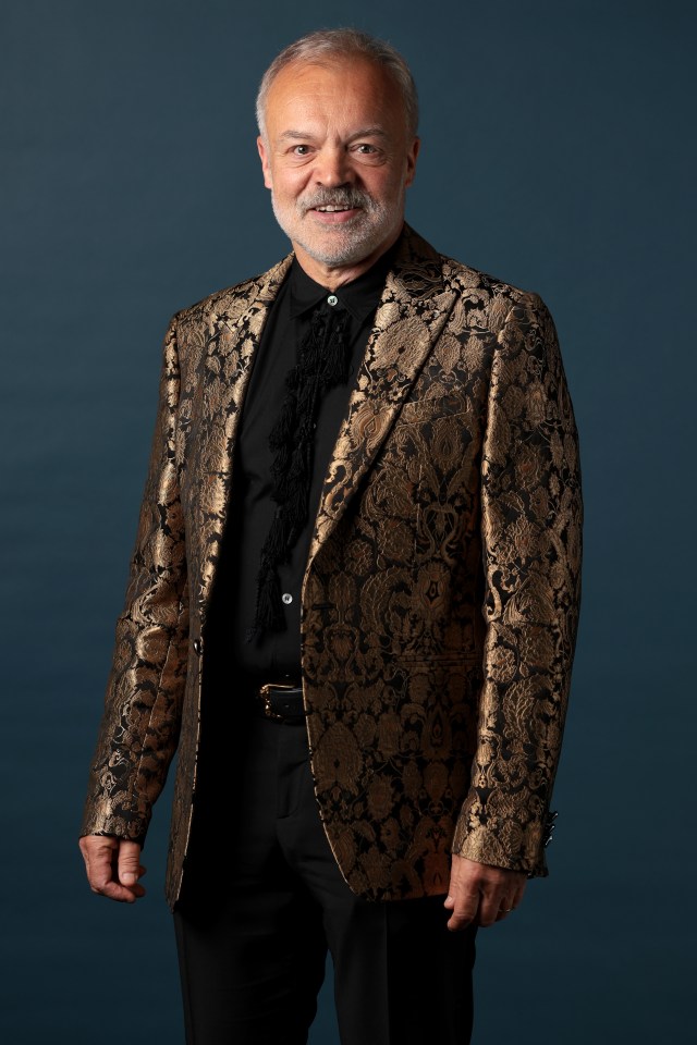 Graham Norton in a gold patterned jacket.