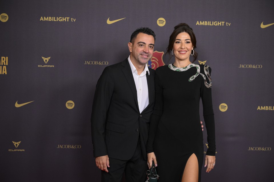 Xavi Hernandez and his wife at a gala.