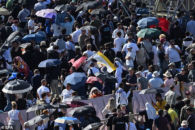 Spectators have waited hours in St Peter's Square in hope of a result