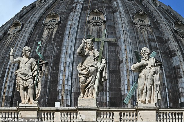 Statues of St Peter's basilica on the second day of the conclave, in The Vatican