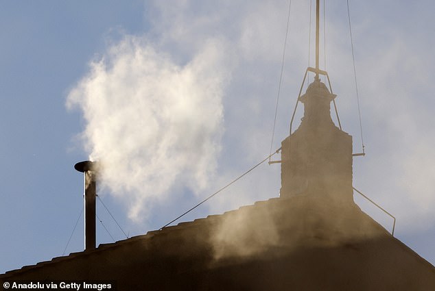 White smoke poured out of the Sistine Chapel chimney Thursday at 6:07 p.m. local time