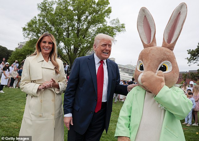 First lady Melania Trump (left) stands alongside President Donald Trump (center) and the Easter Bunny (right) during the annual Easter Egg Roll, which took place last month