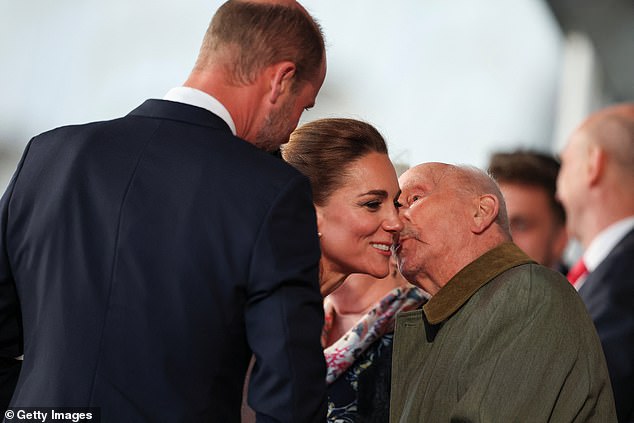 Kate, the Princess of Wales received a kiss from veteran Harry Richardson as she attended the concert