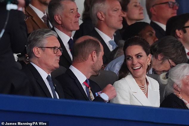 William and Kate smiled as they chatted, while attending the concert with other Royal Family members