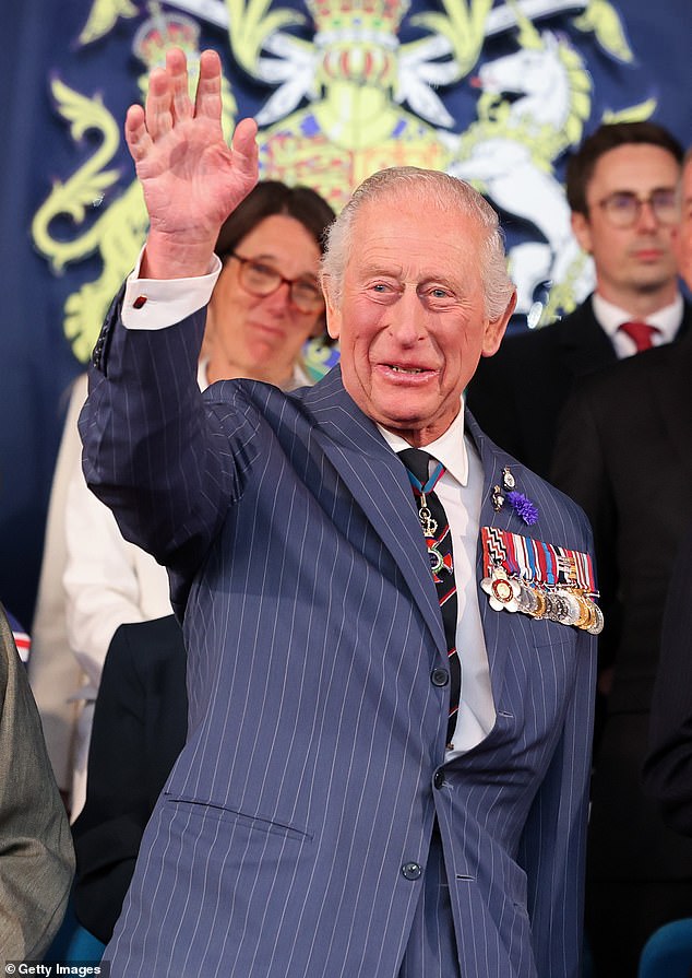 Charles couldn't hold his grin back - as he made an appearance at the concert, with his wife, this evening