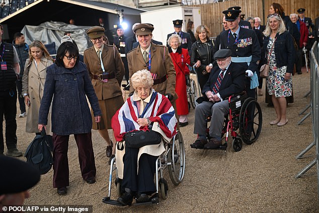 Pictured: Veterans arriving for the celebratory concert, commemorating VE Day, taking place this evening