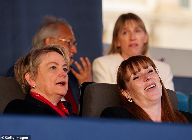 Yvette Cooper and Angela Rayner pictured chatting as they took their seats at the concert this evening