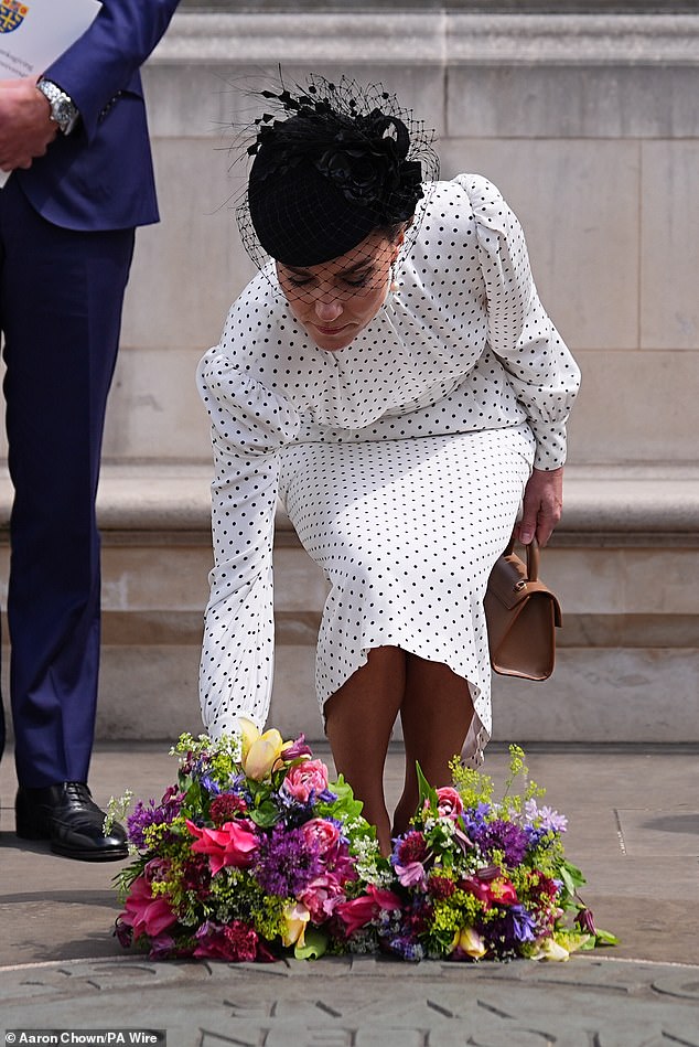 Kate laid flowers at the Innocent Victims' Memorial on Thursday following a Service of Thanksgiving