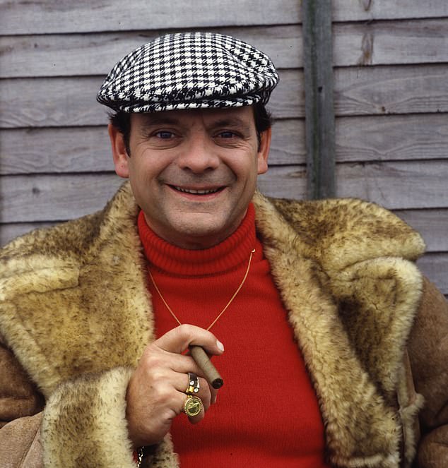 He was discussing how he gets into character as the brash South London market trader when he cheekily took on Del Boy's iconic voice once again (he is pictured in character in 1983)