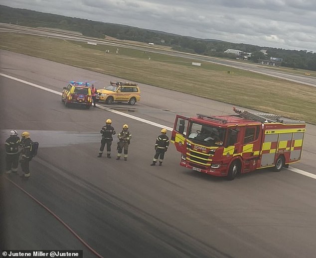 Video footage taken from passengers onboard the flight showed fire engines making their way over to the stationary vehicle, with travellers being told take-off had been 'aborted'