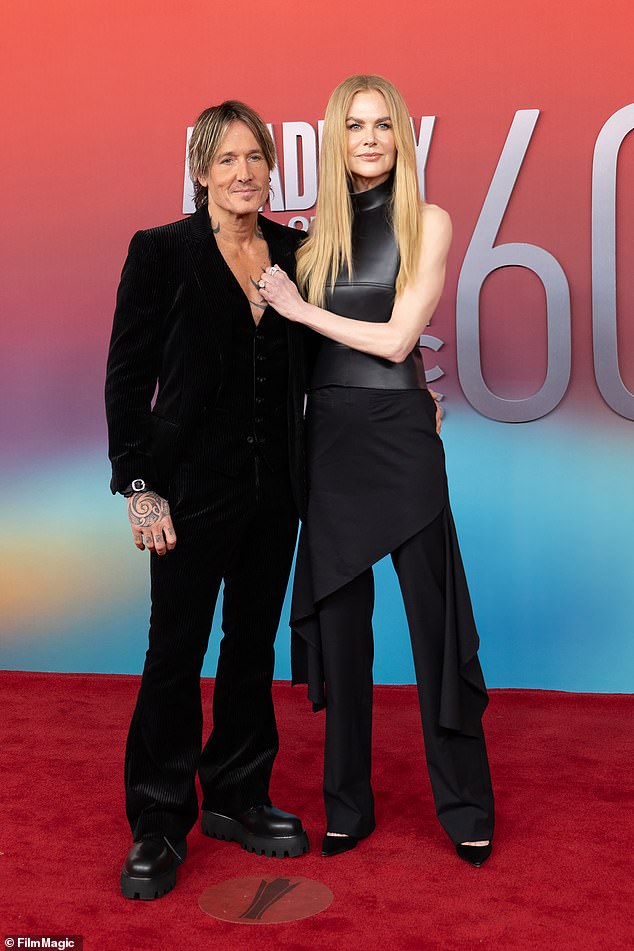 The Babygirl star looked action star chic in a sleek black MONSE ensemble which included a sleeveless leather turtleneck and raven-coloured cargo trousers