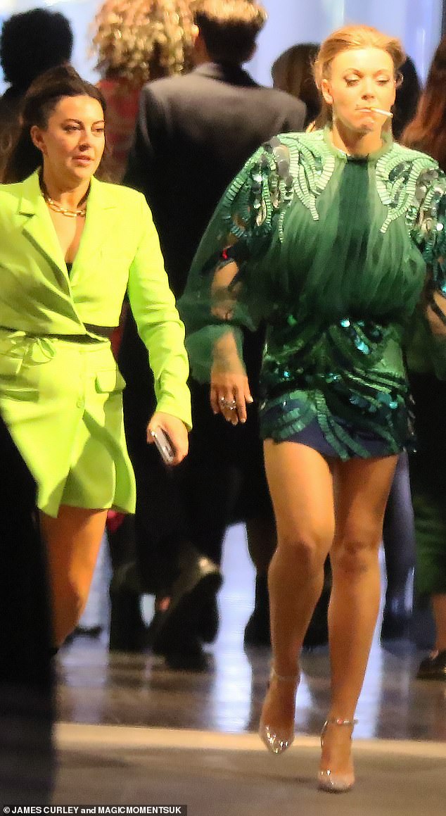 The music artist has been spotted enjoying a cigarette on a night out for years, including while celebrating winning her first ever BRIT Award back in 2022 (seen)