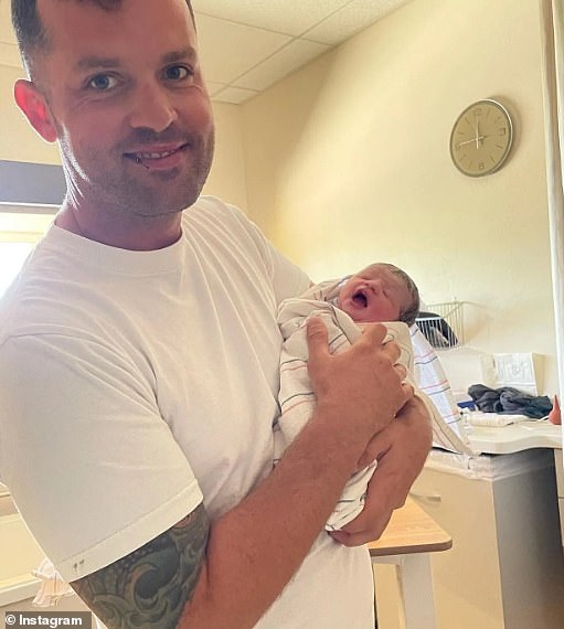 Scholtes, 37, was charged with murder after leaving his two-year-old daughter (pictured together as a newborn) in the back of a hot car in 109F heat while he was inside their house