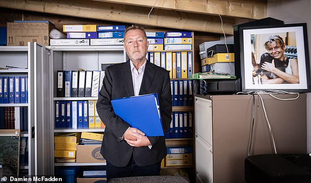 Bob Ward pictured in his 'shed' office which is packed floor to ceiling with files of evidence gathered mainly by his father John during almost 200 trips he made to Africa