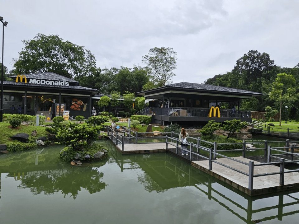 Tranquil McDonald's with Japanese-themed garden and pond.