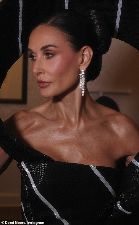 Pictured is another photo of Demi Moore in her Met Gala outfit which was later edited and shared on socials