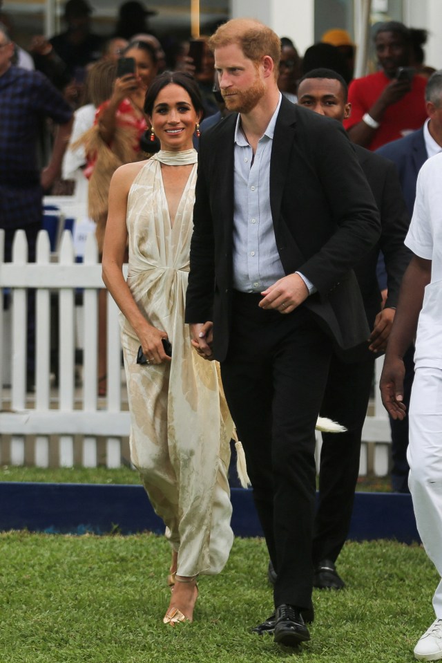 Prince Harry and Meghan Markle at a polo event in Lagos, Nigeria.