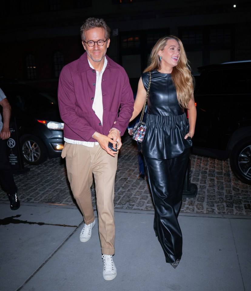 Ryan Reynolds and Blake Lively walking hand-in-hand.