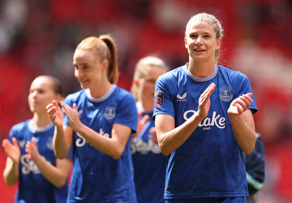 Justine Vanhaevermaet of Everton applauding fans.