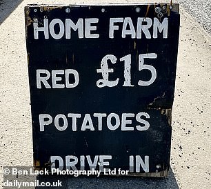 Pictured: A sign inviting people to buy red potatoes from the farm