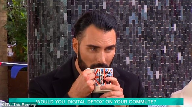 The awkward scene saw Rylan clutch onto his cup of tea and raise his eyebrows as he glanced around the room, which fans found hilarious