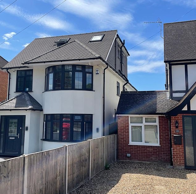 The side dormer windows on either side look to be overlooking the adjacent properties