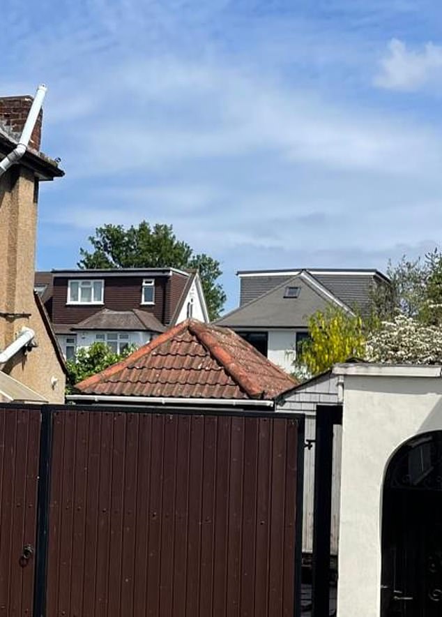 A view of the loft conversion from the road directly behind the property