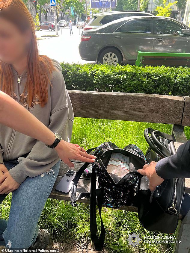 The unnamed mother was detained when the buyer handed her cash, according to the country's national police