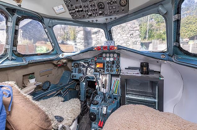 The 1970s private jet, once the property of an oil company, still has its original cockpit in tact for guests checking in at the glamping pod in Dolgellau in Gwynedd, Wales