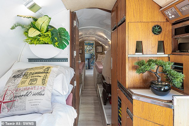 The original body of the plane is now a cosy seating and bedroom, with a cabin tacked on the back of the aircraft housing a double bed