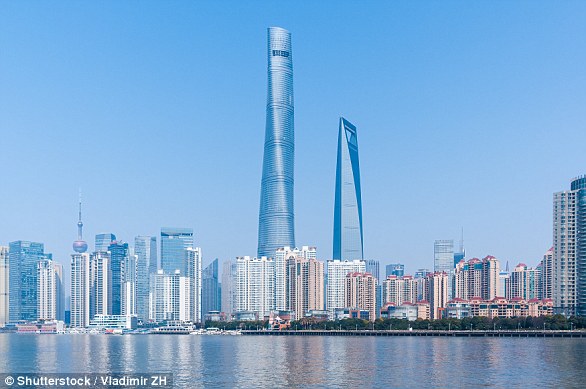 The Shanghai Tower (left) stands next to the Shanghai World Financial Centre (492 metres, 1,614 feet). It took the Chinese 11 years to build the nation's tallest building