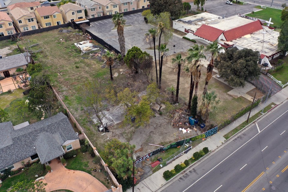Aerial view of a property next to a church in Los Angeles.