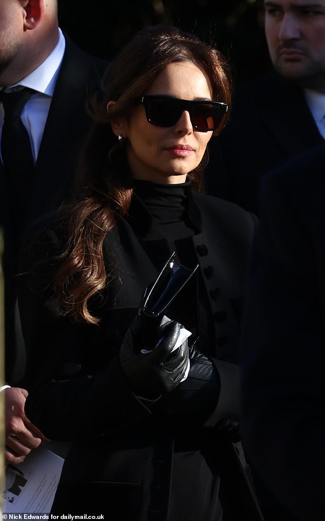The singer was said to be 'dreadfully sad' by a source close to the Payne family, who added that she and Liam were bonded for life through their son (seen at funeral)