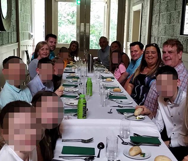 Pictured: Carol with Ann and Peter with their family at lunch