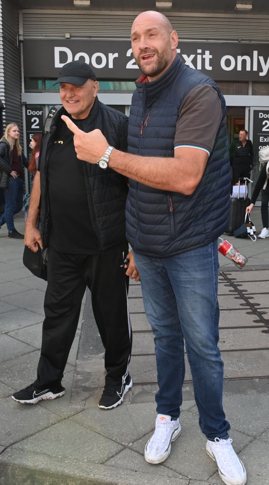 Tyson Fury and his father arriving in Manchester.